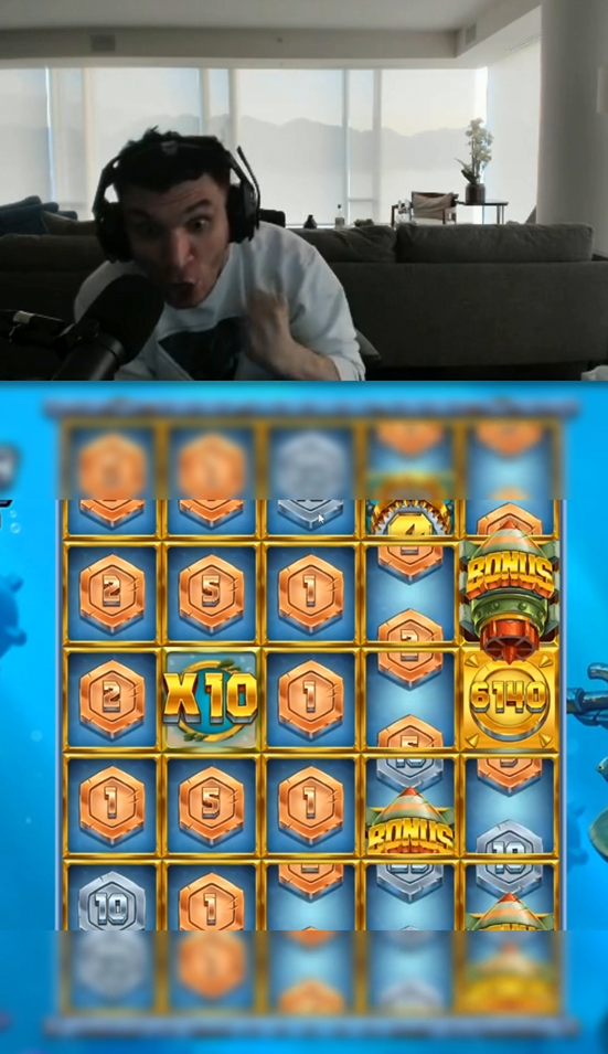The finished vertical clip: the webcam above, the slot game below